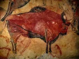 La salud en tiempos del Paleolítico Pintura rupestre de un bisonte representando la salud y supervivencia en el Paleolítico
